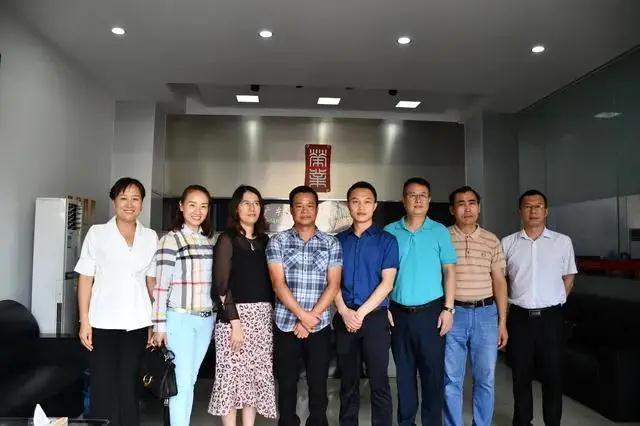 重慶市秀山自治縣到廣東榮業(yè)食品有限公司考察交流